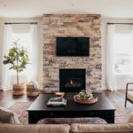 JustAboutFarms modern living room with fireplace - Eddy Homes - Festival of Homes