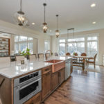 Laurel Pointe kitchen sink island - Infinity Homes - Festival of Homes
