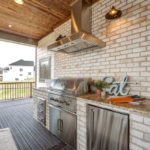 Laurel Pointe outdoor grill covered patio - Infinity Homes - Festival of Homes